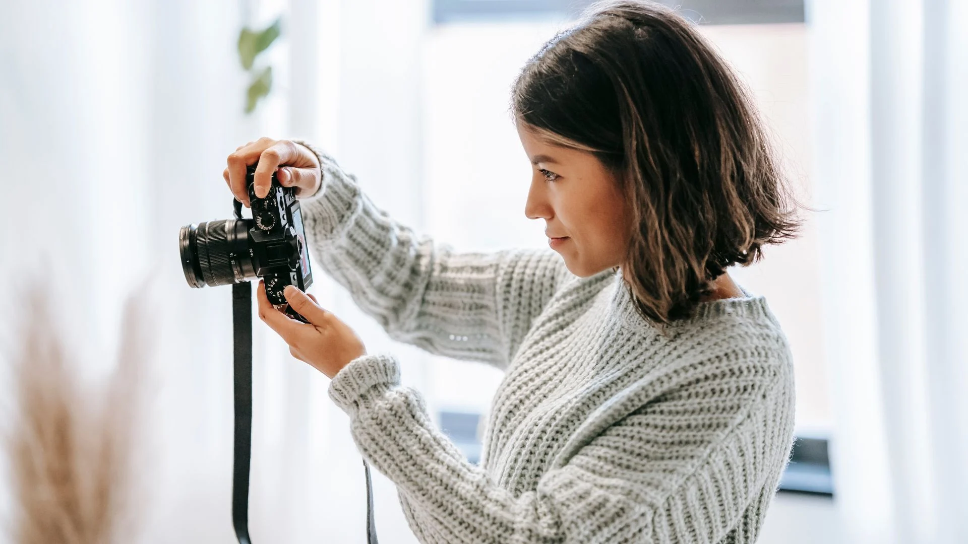 Photographer at work with camera and soft light
